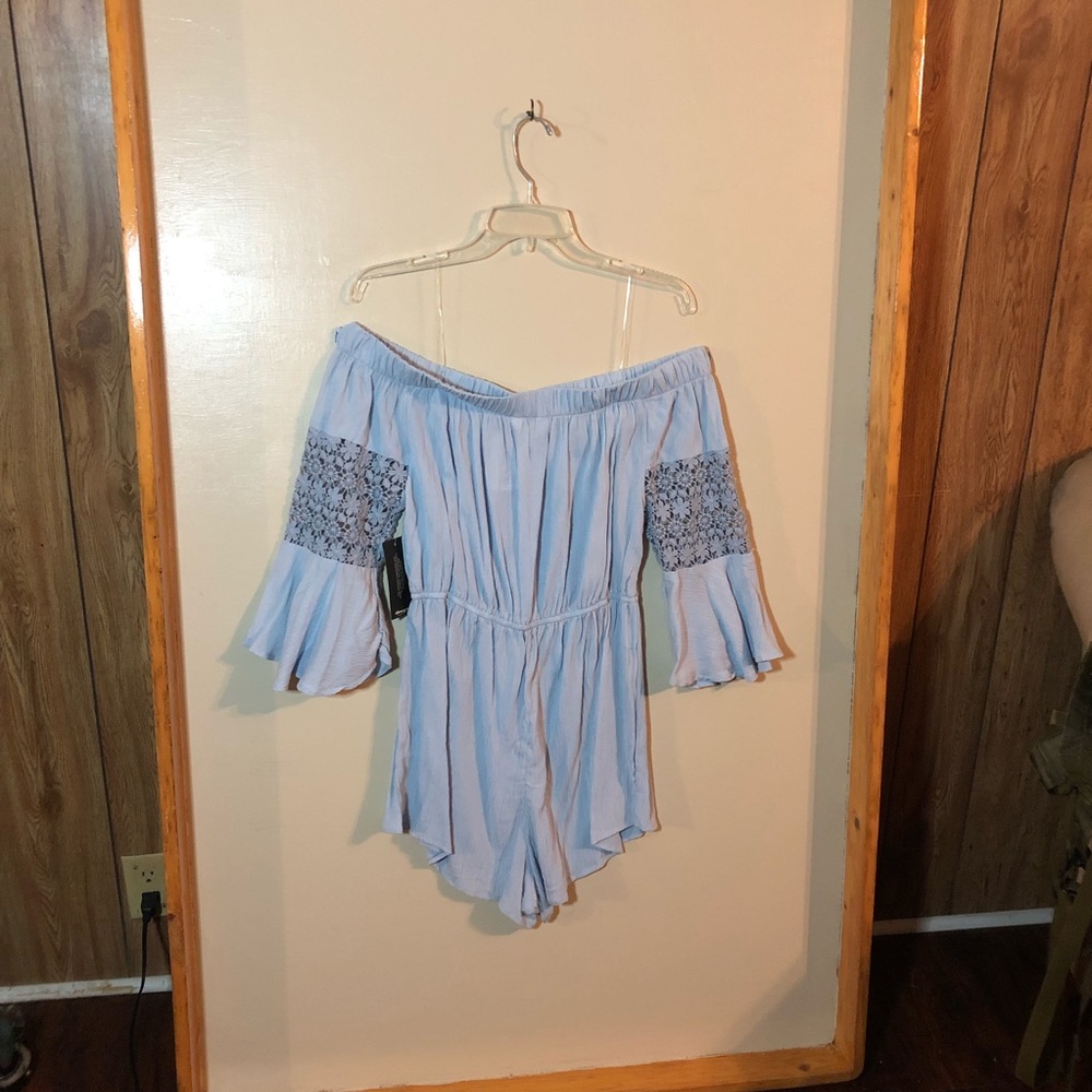 New light blue “Hint of Blush” romper